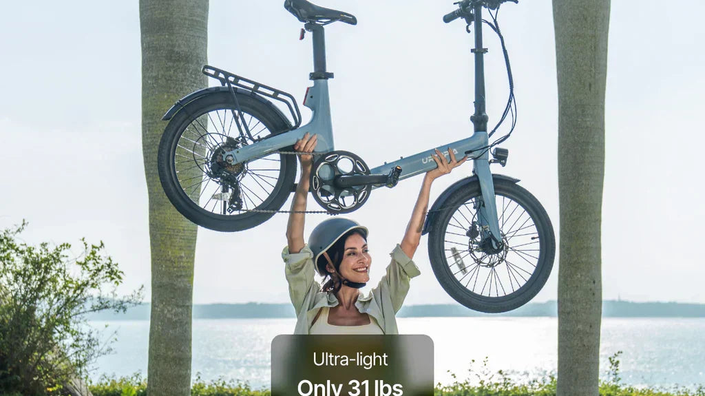 woman holding a Urtopia e-bike